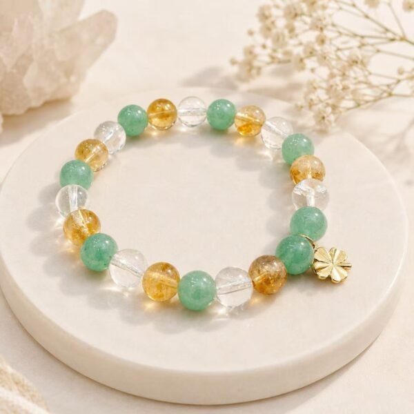 Spring Fortune natural stone bracelet with green, golden-yellow and clear beads and gold four-leaf clover charm